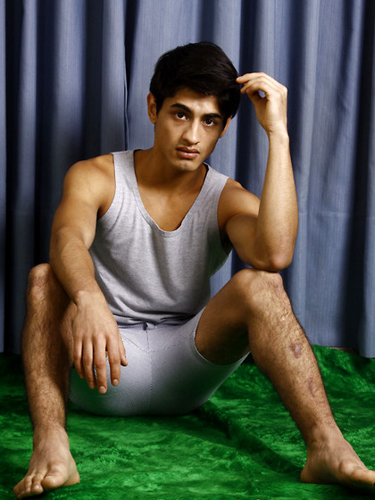 Good-looking twink posing at the studio