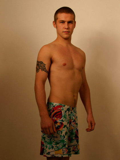 Blonde stud Jack posing butt naked with his huge dick in his hands