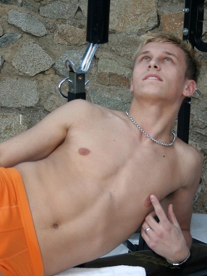 Breathtaking gay model Sacky strips his orange undies & poses naked at the gym
